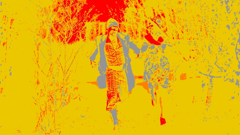 Overexposed frame in false color, mostly yellow with orange and a red sky
